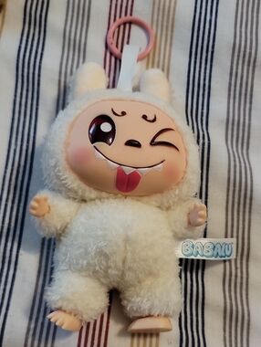 6-inch Babalu Dangler, Series 1 plush toy featuring a white bunny character